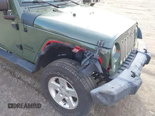 2016 Jeep Wrangler Sport with VIN 1C4AJWAG7GL330159, listed as a IAAI auction lot 41530415 with 98,554 mi miles and . Bid and sale history available at carsss.com. Image 6.
