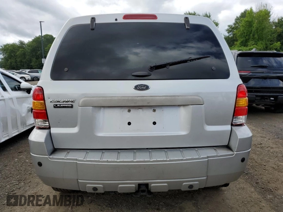 2005 Ford Escape Limited with VIN 1FMCU94165KA11181, listed as a Copart auction lot 62880725 with 180,152 mi miles and Salvage title. Bid and sale history available at DreamBid. Image 6.