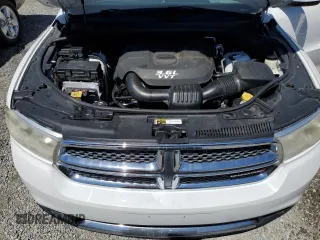 2013 Dodge Durango SXT z VIN 1C4RDHAG5DC673733, wystawiony jako Copart lot #56464215 z przebiegiem 224 075 mil mil oraz Czysty tytuł • Clean title. Historia ofert i sprzedaży dostępna na DreamBid. Obrazek 12.