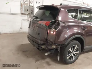 2017 Toyota RAV4 XLE with VIN 2T3RFREV3HW679851, listed as a IAAI auction lot 41708097 with 128,482 mi miles. Bid and sale history available at carsss.com. Image 6.
