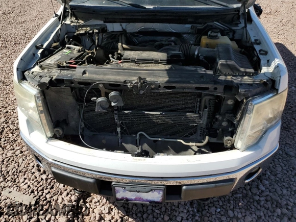 2013 Ford F-150 XL with VIN 1FTFW1EF8DFC59091, listed as a Copart auction lot 61582485 with 107,640 mi miles and Salvage title. Bid and sale history available at DreamBid. Image 11.