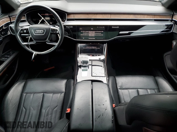2022 Audi A8 with VIN WAULDAF85NN004895, listed as a Copart auction lot 51758025 with 61,164 mi miles and Salvage title. Bid and sale history available at DreamBid. Image 8.
