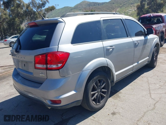 2017 Dodge Journey SXT z VIN 3C4PDCBG0HT530742, wystawiony jako IAAI lot #41997800 z przebiegiem 189 186 mil mil oraz . Historia ofert i sprzedaży dostępna na DreamBid. Obrazek 4.