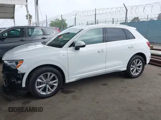 2021 Audi Q3 S line Premium z VIN WA1DECF31M1074155, wystawiony jako IAAI lot #42381678 z przebiegiem 36 894 mil mil oraz . Historia ofert i sprzedaży dostępna na DreamBid. Obrazek 15.