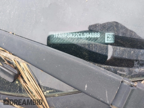 2012 Ford Focus SE z VIN 1FAHP3K22CL394088, wystawiony jako IAAI lot #42263710 z przebiegiem 147 259 mil mil oraz . Historia ofert i sprzedaży dostępna na DreamBid. Obrazek 12.