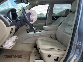 2015 Jeep Grand Cherokee Overland with VIN 1C4RJFCG3FC880084, listed as a Copart auction lot 57291165 with 112,442 mi miles and Salvage title. Bid and sale history available at DreamBid. Image 7.