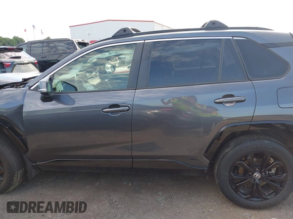 2022 Toyota RAV4 Hybrid SE z VIN JTM16RFV5ND053223, wystawiony jako IAAI lot #42217744 z przebiegiem 43 878 mil mil oraz . Historia ofert i sprzedaży dostępna na DreamBid. Obrazek 13.