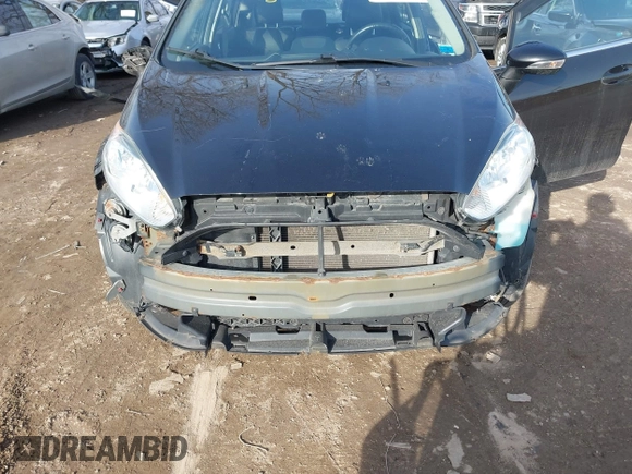 2014 Ford Fiesta Titanium z VIN 3FADP4FJXEM127644, wystawiony jako IAAI lot #41555040 z przebiegiem 107 046 mil mil oraz . Historia ofert i sprzedaży dostępna na DreamBid. Obrazek 6.