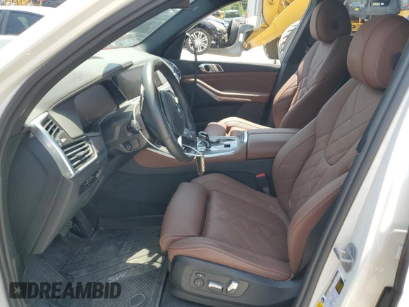 2023 BMW X5 sDrive40i with VIN 5UXCR4C04P9R12480, listed as a Copart auction lot 61082815 with 17,249 mi miles and Salvage title. Bid and sale history available at DreamBid. Image 7.