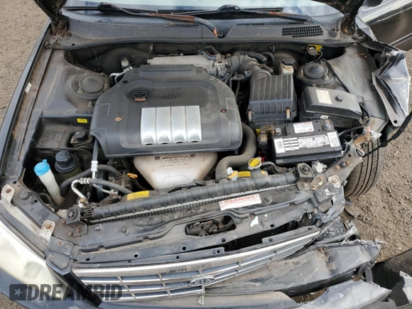 2001 Kia Optima LX z VIN KNAGD126315028712, wystawiony jako Copart lot #85302564 z przebiegiem 81 722 mil mil oraz Nie do naprawy • Non repairable. Historia ofert i sprzedaży dostępna na DreamBid. Obrazek 12.