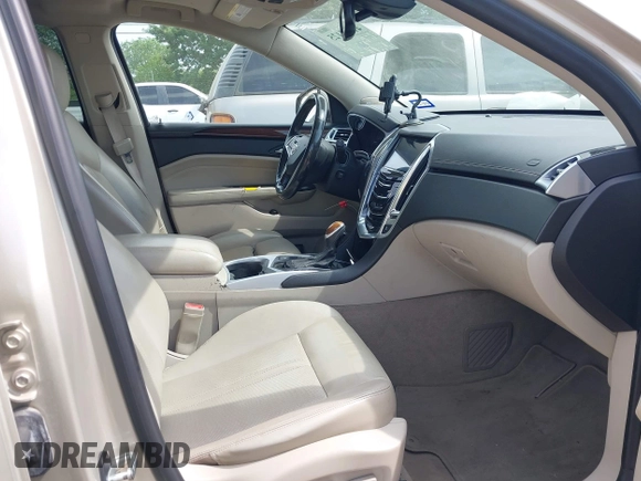 2013 Cadillac SRX Performance Collection with VIN 3GYFNDE34DS634099, listed as a IAAI auction lot 41931125 with 134,318 mi miles and . Bid and sale history available at carsss.com. Image 5.