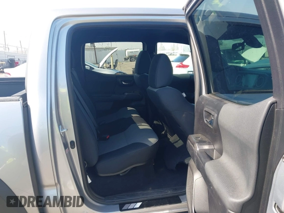 2021 Toyota Tacoma SR with VIN 5TFCZ5AN6MX270972, listed as a IAAI auction lot 42460823 with 76,062 mi miles and . Bid and sale history available at DreamBid. Image 8.