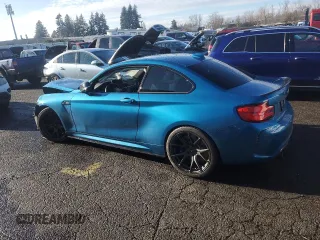 2018 BMW M2 z VIN WBS1J5C59JVD36008, wystawiony jako Copart lot #87876685 z przebiegiem 24 255 mil mil oraz Szkoda całkowita • Salvage title. Historia ofert i sprzedaży dostępna na DreamBid. Obrazek 2.