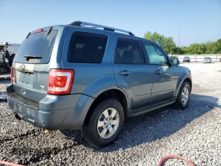 2010 Ford Escape Limited with VIN 1FMCU0EG5AKD24442, listed as a Copart auction lot 59875095 with 157,794 mi miles and Salvage title. Bid and sale history available at DreamBid. Image 3.