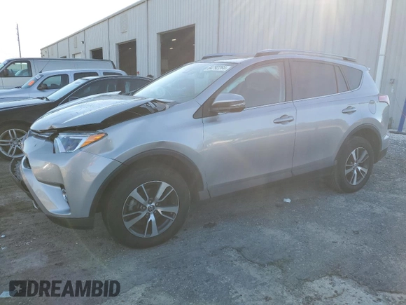 2018 Toyota RAV4 XLE with VIN 2T3RFREV8JW725504, listed as a Copart auction lot 84792264 with 41,501 mi miles and Salvage Title. Bid and sale history available at carsss.com. Image 1.