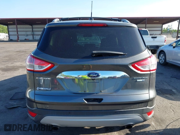 2016 Ford Escape Titanium with VIN 1FMCU9J94GUA63359, listed as a IAAI auction lot 41954514 with 94,315 mi miles. Bid and sale history available at carsss.com. Image 16.