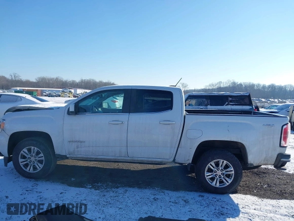 2019 GMC Canyon 4WD SLE with VIN 1GTG6CEN1K1301425, listed as a IAAI auction lot 41358278 with 105,106 mi miles. Bid and sale history available at carsss.com. Image 14.
