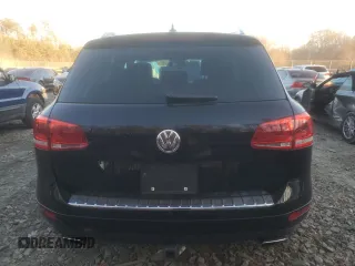 2013 Volkswagen Touareg Lux with VIN WVGEF9BP1DD001025, listed as a Copart auction lot 83784314 with 205,871 mi miles and Salvage Title. Bid and sale history available at DreamBid. Image 6.