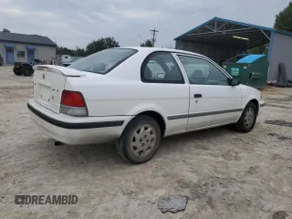 1998 Toyota Tercel DX z VIN JT2AC52L2W0307400, wystawiony jako Copart lot #80497644 z przebiegiem 72 167 mil mil oraz Czysty tytuł • Clean title. Historia ofert i sprzedaży dostępna na DreamBid. Obrazek 3.