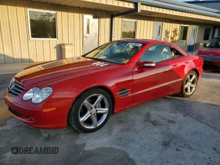 2006 Mercedes-Benz SL 500 with VIN WDBSK75F76F116843, listed as a Copart auction lot 87216664 with 54,002 mi miles and Salvage title. Bid and sale history available at DreamBid. Image 1.