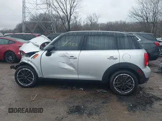 2015 MINI Countryman with VIN WMWZB3C50FWR44622, listed as a IAAI auction lot 41519725 with 229,985 mi miles and . Bid and sale history available at DreamBid. Image 15.