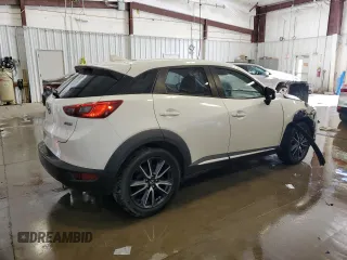2018 Mazda CX-3 Grand Touring z VIN JM1DKFD7XJ0321776, wystawiony jako Copart lot #49093765 z przebiegiem 94 770 mil mil oraz Tytuł czysty. Historia ofert i sprzedaży dostępna na DreamBid. Obrazek 3.