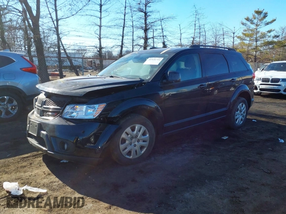 2019 Dodge Journey SE with VIN 3C4PDCBG6KT874924, listed as a IAAI auction lot 41426744 with 60,479 mi miles and . Bid and sale history available at DreamBid. Image 2.