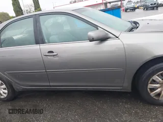 2006 Toyota Camry STD with VIN 4T1BE32KX6U736211, listed as a IAAI auction lot 41730669 with 112,648 mi miles. Bid and sale history available at carsss.com. Image 13.