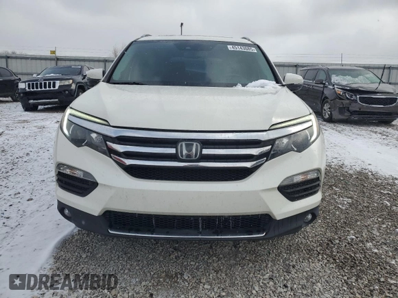 2018 Honda Pilot Touring z VIN 5FNYF6H99JB028034, wystawiony jako Copart lot #45143085 z przebiegiem 70 060 mil mil oraz Szkoda całkowita • Salvage title. Historia ofert i sprzedaży dostępna na DreamBid. Obrazek 5.