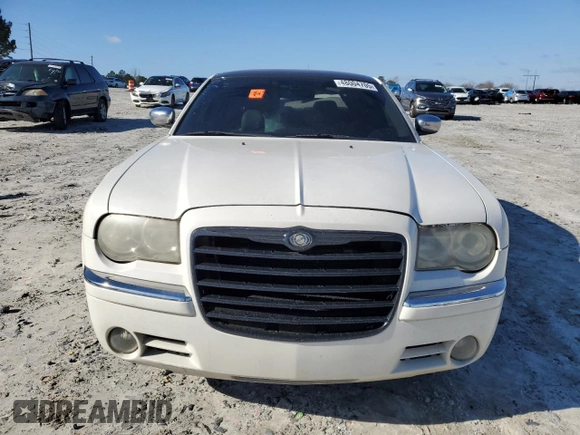 2006 Chrysler 300 C with VIN 2C3KA63H56H477106, listed as a Copart auction lot 48004705 with 174,593 mi miles and Salvage Title. Bid and sale history available at carsss.com. Image 5.