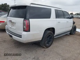 2019 GMC Yukon XL SLT with VIN 1GKS1GKC1KR384332, listed as a IAAI auction lot 41232450 with 109,219 mi miles. Bid and sale history available at carsss.com. Image 4.