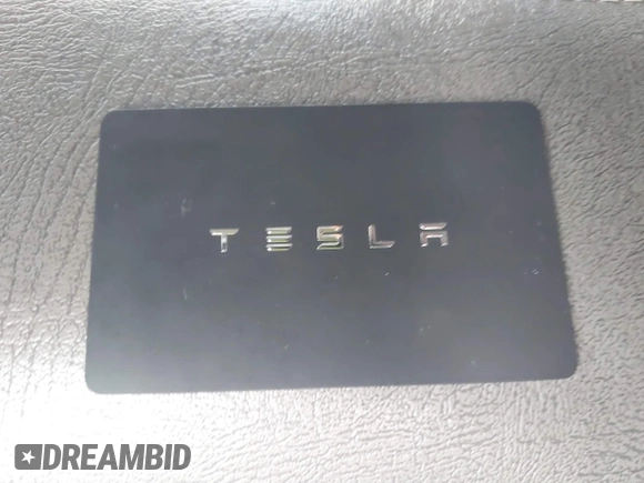 2020 Tesla Model 3 Standard Range Plus with VIN 5YJ3E1EA7LF785838, listed as a IAAI auction lot 41586081 with 38,392 mi miles and . Bid and sale history available at carsss.com. Image 11.