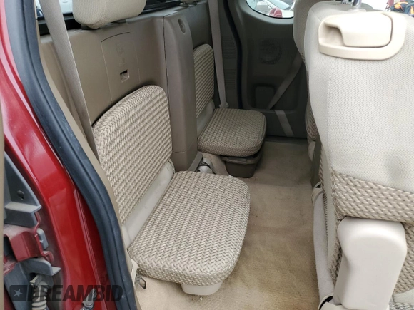 2006 Nissan Frontier SE z VIN 1N6AD06U36C428118, wystawiony jako Copart lot #53117415 z przebiegiem 164 046 mil mil oraz Szkoda całkowita • Salvage title. Historia ofert i sprzedaży dostępna na DreamBid. Obrazek 10.