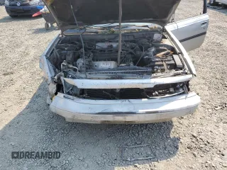 1989 Toyota Camry LE ECT z VIN JT2SV22E3K3346603, wystawiony jako Copart lot #62570044 z przebiegiem 213 105 mil mil oraz Szkoda całkowita • Salvage title. Historia ofert i sprzedaży dostępna na DreamBid. Obrazek 13.
