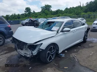 2019 Honda Accord Sport z VIN 1HGCV2F37KA012673, wystawiony jako IAAI lot #42275404 z przebiegiem 148 924 mil mil oraz . Historia ofert i sprzedaży dostępna na DreamBid. Obrazek 2.