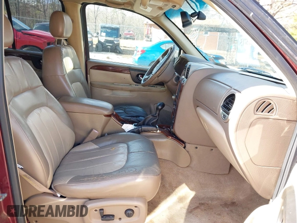 2004 GMC Envoy SLE with VIN 1GKDS13S342287315, listed as a IAAI auction lot 41486715 with 186,129 mi miles. Bid and sale history available at carsss.com. Image 5.