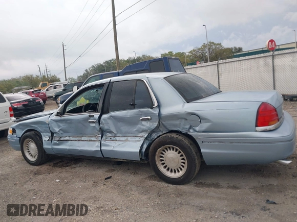 1999 Ford Crown Victoria z VIN 2FAFP73WXXX221069, wystawiony jako IAAI lot #41750127 z przebiegiem 177 142 mil mil oraz . Historia ofert i sprzedaży dostępna na DreamBid. Obrazek 14.