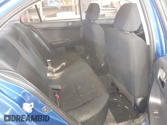 2017 Mitsubishi Lancer ES with VIN JA32V2FW4HU006890, listed as a IAAI auction lot 41636035 with 165,077 mi miles. Bid and sale history available at carsss.com. Image 8.