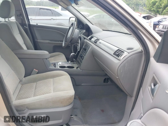 2006 Ford Five Hundred SE с VIN 1FAFP23106G160133, выставлен на аукционе IAAI как лот 42284758 с пробегом 216 810 миль миль и . История ставок и продаж доступна на DreamBid. Изображение 5.