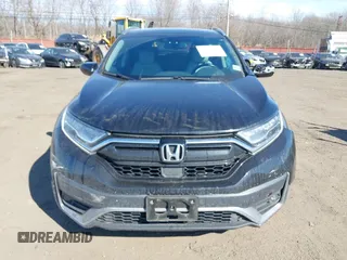 2020 Honda CR-V Touring with VIN 2HKRW2H98LH626651, listed as a IAAI auction lot 41668951 with 64,391 mi miles and . Bid and sale history available at DreamBid. Image 12.
