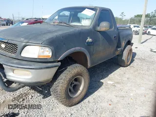 1997 Ford F-150 with VIN 1FTDF0864VKD06980, listed as a IAAI auction lot 42230820 with 174,174 mi miles and . Bid and sale history available at DreamBid. Image 2.