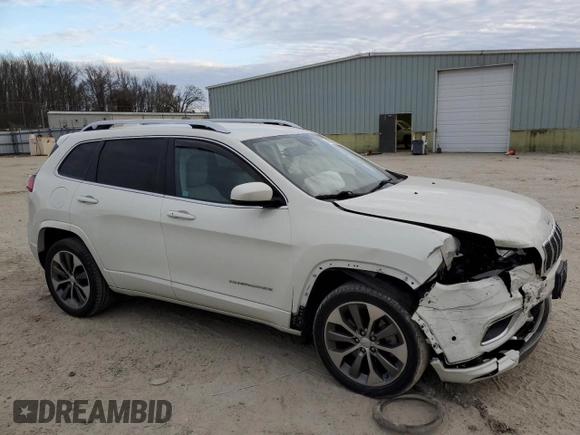 2019 Jeep Cherokee with VIN 1C4PJLJX3KD381640, listed as a Copart auction lot 42463593 with 28,310 mi miles and . Bid and sale history available at DreamBid. Image 4.
