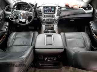 2015 Chevrolet Suburban LT with VIN 1GNSCJKC1FR159411, listed as a Copart auction lot 52169465 with 145,511 mi miles and Salvage title. Bid and sale history available at DreamBid. Image 8.