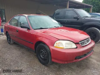 1997 Honda Civic LX "O" w/Air with VIN 1HGEJ6672VL019621, listed as a IAAI auction lot 42081226 with 194,957 mi miles. Bid and sale history available at carsss.com. Image 1.
