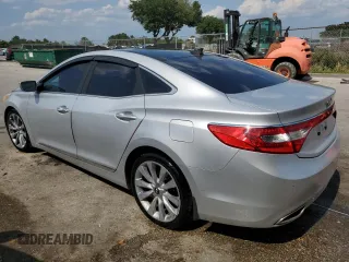 2013 Hyundai Azera z VIN KMHFH4JG8DA213103, wystawiony jako Copart lot #57781955 z przebiegiem 173 515 mil mil oraz Czysty tytuł • Clean title. Historia ofert i sprzedaży dostępna na DreamBid. Obrazek 2.