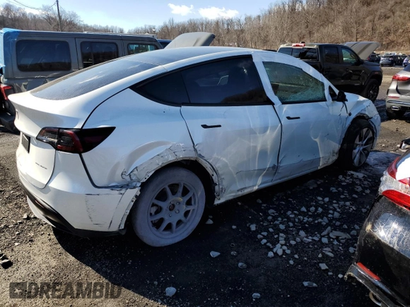 2023 Tesla Model Y Long Range z VIN 7SAYGDEE5PF785124, wystawiony jako Copart lot #56553785 z przebiegiem 31 341 mil mil oraz Szkoda całkowita • Salvage title. Historia ofert i sprzedaży dostępna na DreamBid. Obrazek 3.