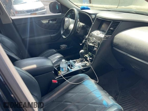 2009 Infiniti FX z VIN JNRAS18W59M157834, wystawiony jako Copart lot #55642965 z przebiegiem 165 571 mil mil oraz Czysty tytuł • Clean title. Historia ofert i sprzedaży dostępna na DreamBid. Obrazek 5.