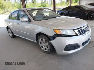 2009 Kia Optima LX z VIN KNAGE228795357008, wystawiony jako IAAI lot #42228948 z przebiegiem 148 194 mil mil oraz . Historia ofert i sprzedaży dostępna na DreamBid. Obrazek 1.