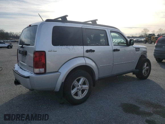 2009 Dodge Nitro SXT with VIN 1D8GU28K19W545432, listed as a Copart auction lot 86243914 with 144,577 mi miles and Salvage Title. Bid and sale history available at DreamBid. Image 3.