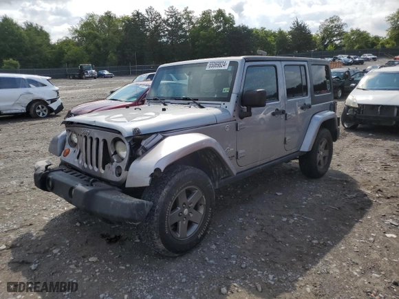 2013 Jeep Wrangler Unlimited Sport with VIN 1C4BJWDG1DL601972, listed as a Copart auction lot 65069824 with 166,274 mi miles and Salvage Title. Bid and sale history available at carsss.com. Image 1.